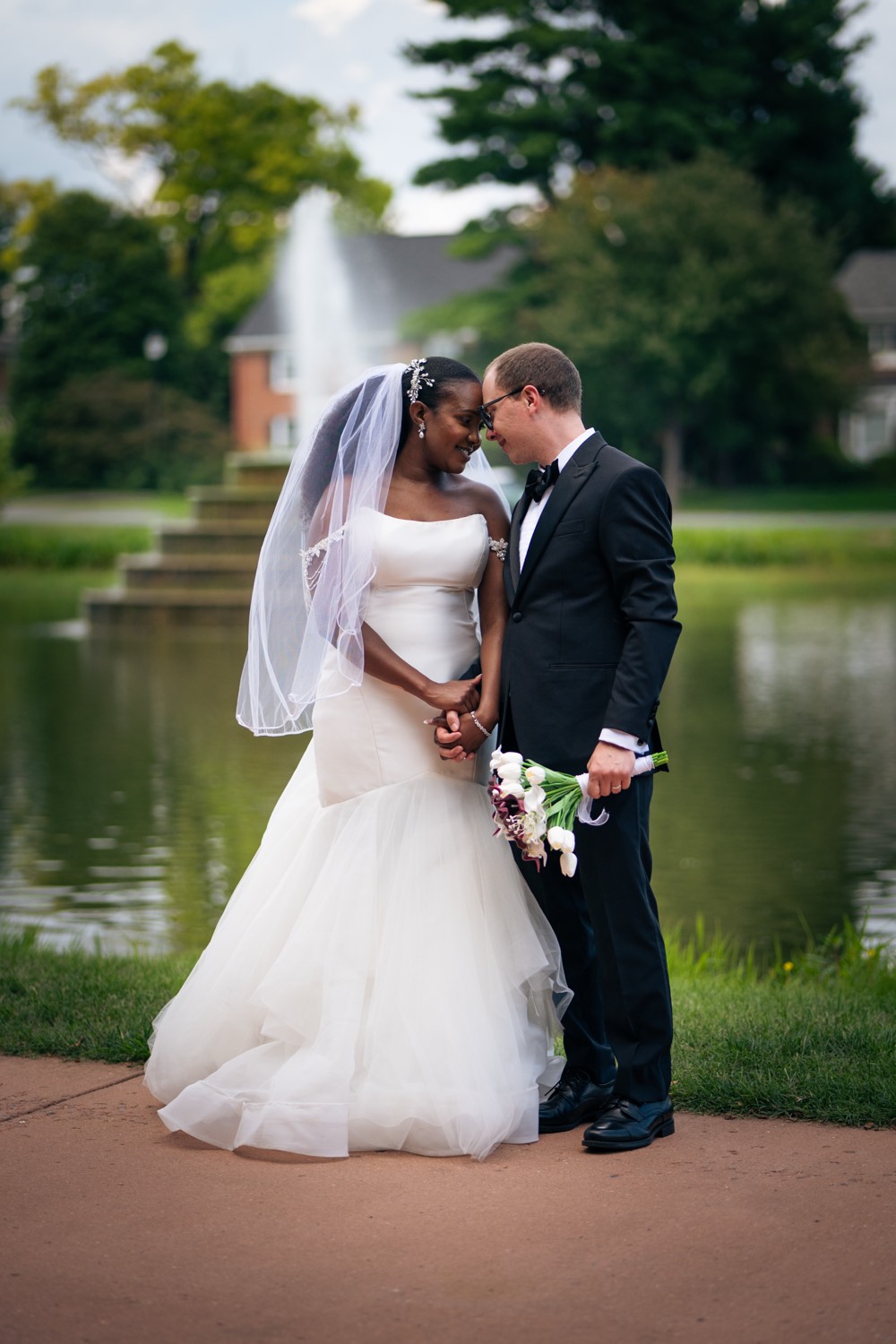 Couple photographed by the water