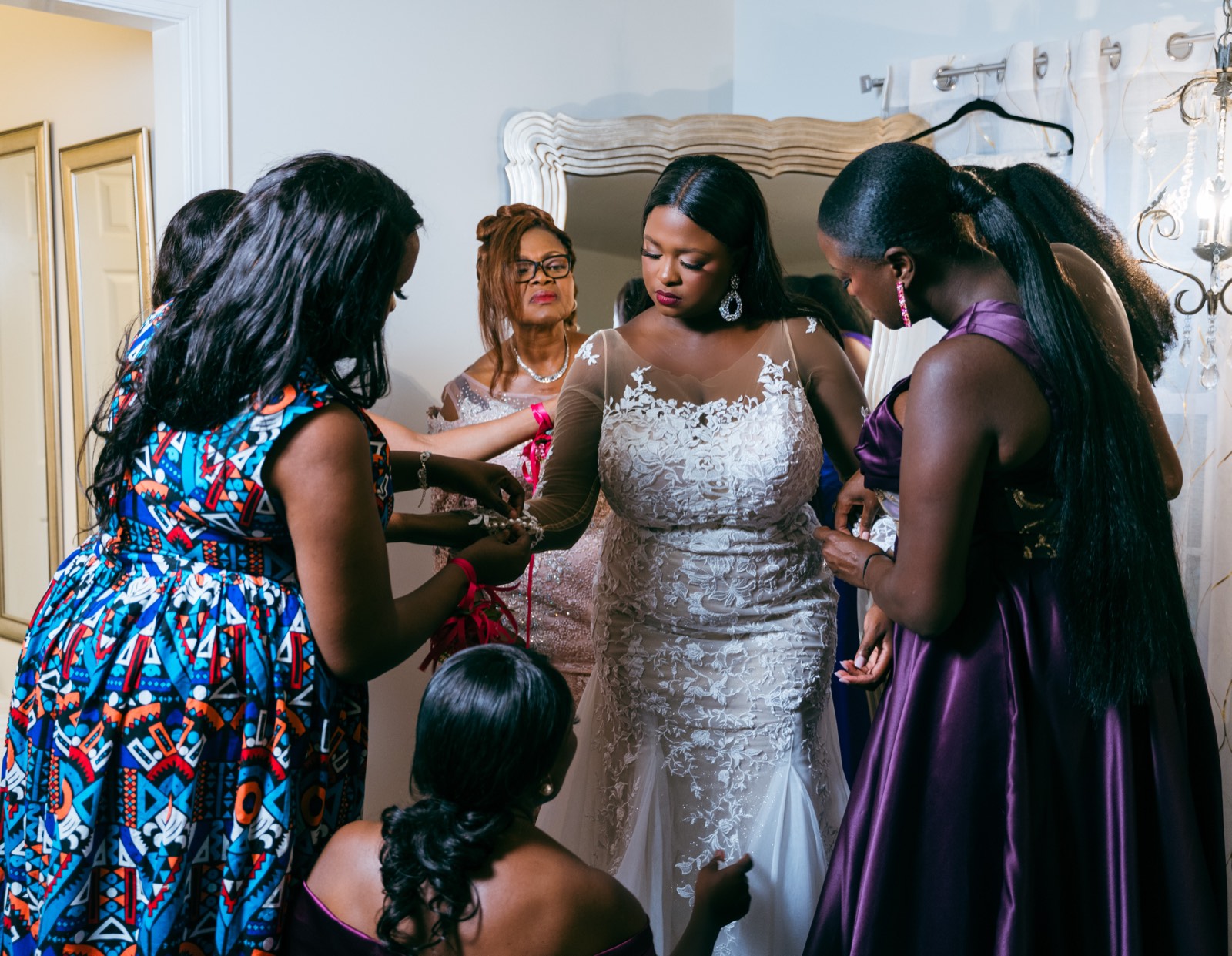 Guests in patterned dresses at the celebration