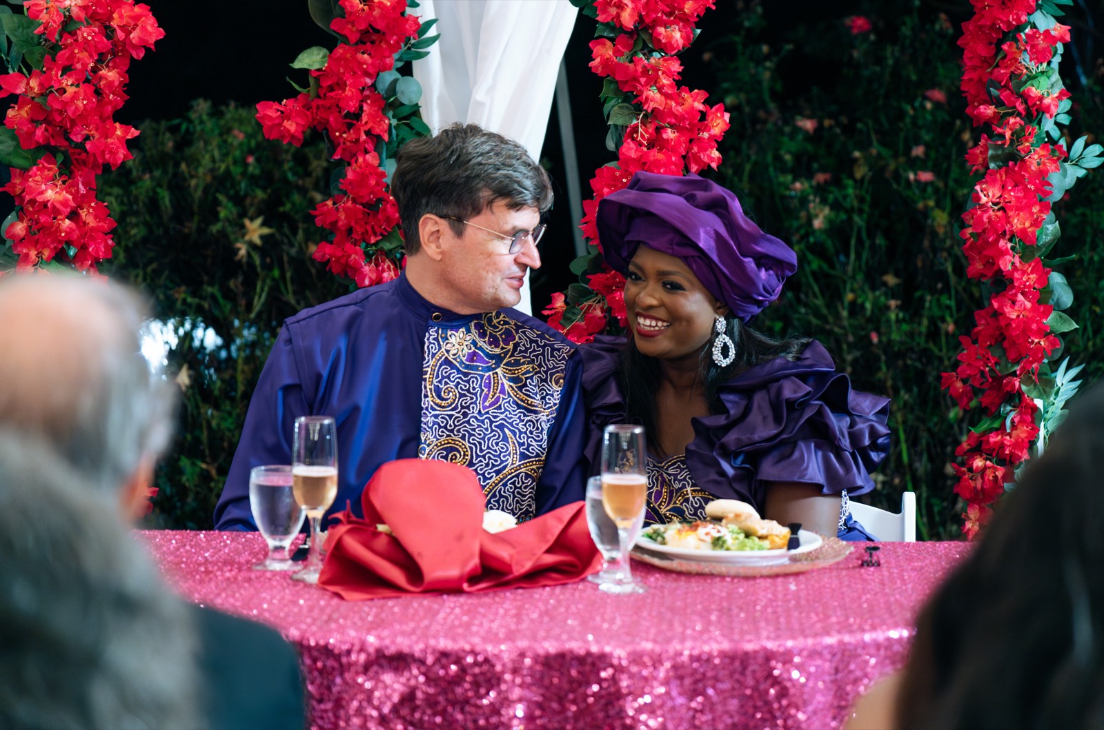Guest seated at a decorated reception table